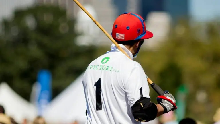 A polo player holding a mallet